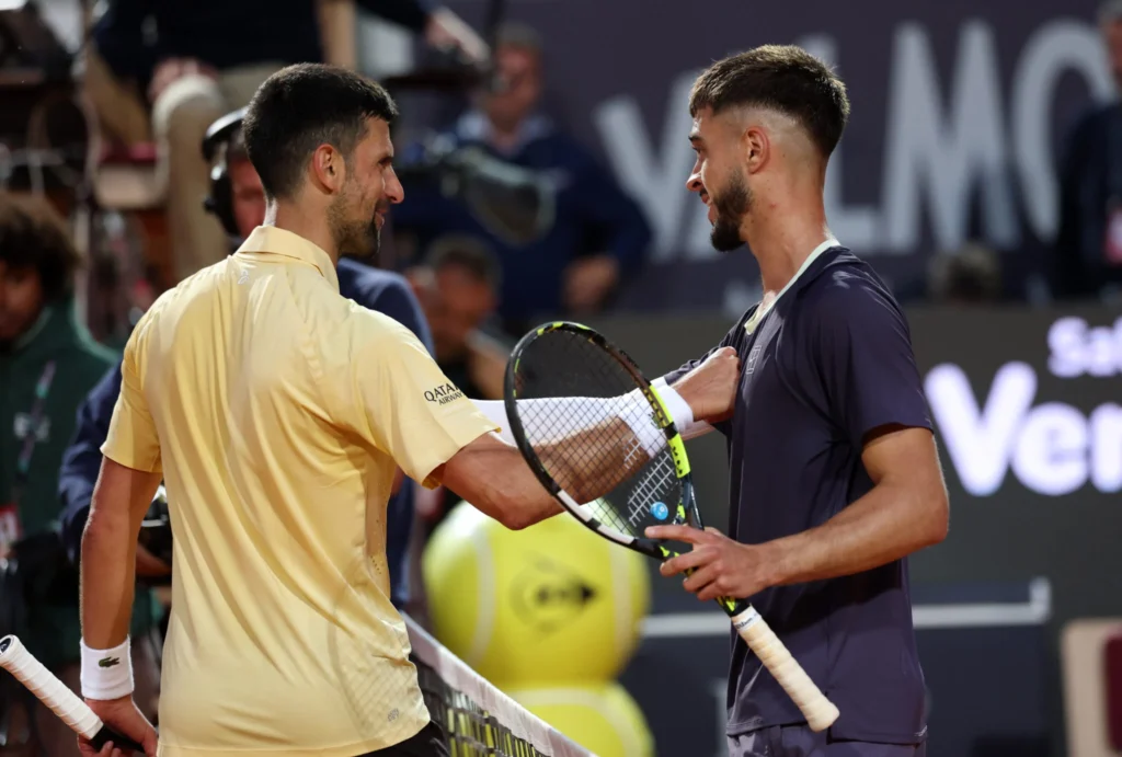 Novak Djokovic crashes out of the 2026 Italian Open after a shocking defeat to 20-year-old qualifier Dino Prizmic. Read the full Day 3 recap, including Rybakina's victory.